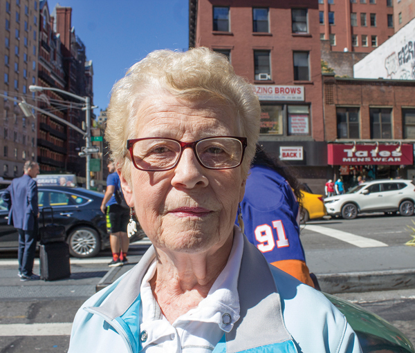 Nancy Spannbauer, who lives nearby, showed up to support businesses on W. 23rd St., between Sixth & Seventh Aves. Photo by Naeisha Rose.